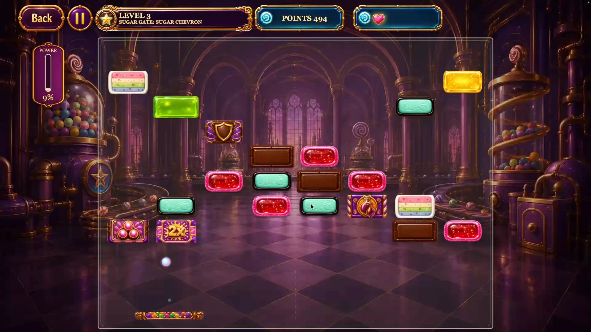A glowing ball and candy-colored paddle sit beneath chocolate and jewel-like blocks.