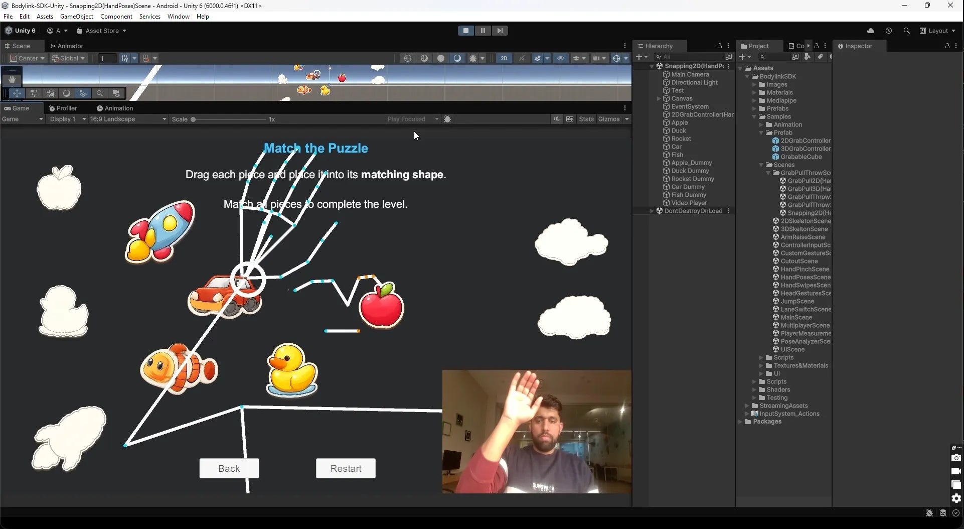 A Unity game viewport demonstrates hand tracking to move puzzle pieces